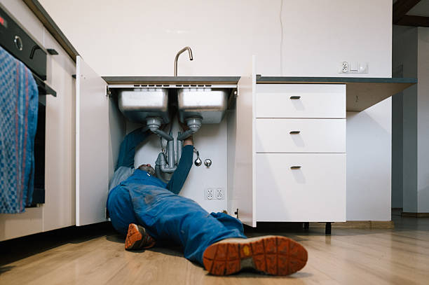 Professional Drain Cleaning technician working in Wilder, KY